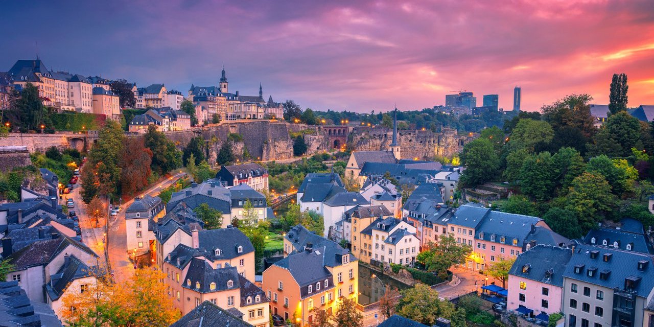 Aerial cityscape image of old town Luxembourg City skyline during beautiful sunrise